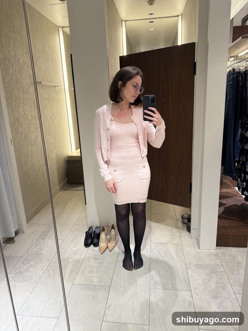 Woman in Pink Dress Taking Mirror Selfie
