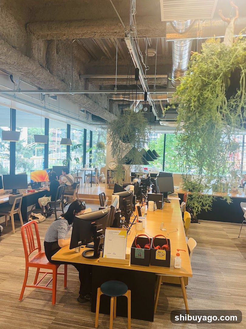 Office Interior with Plants and Workstations