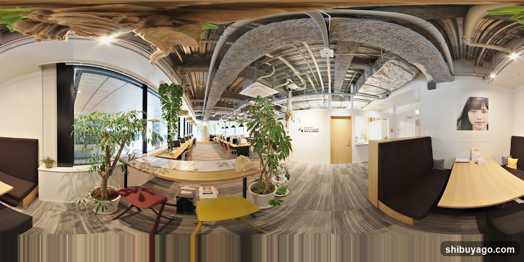 Modern Office Interior with Plants and Seating Areas