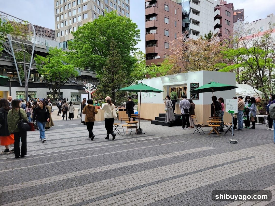 Outdoor Market Scene with Food Stall