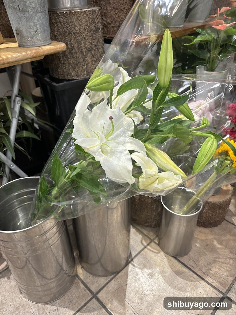 White Lilies in Metal Buckets