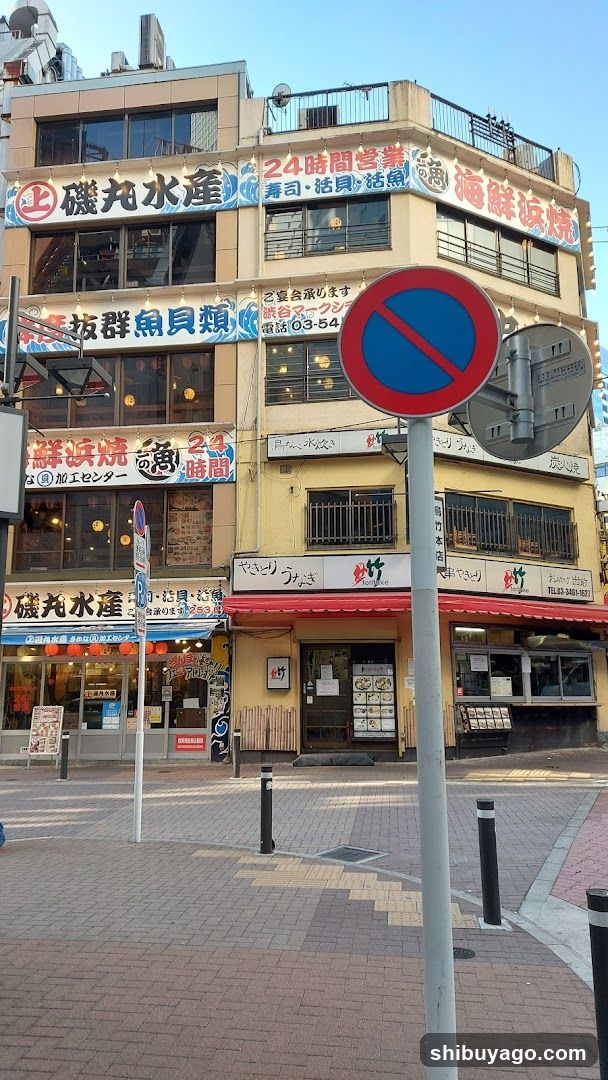 Street scene with shop fronts and signage