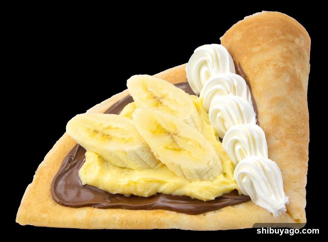 Banana Crepe with Chocolate and Whipped Cream