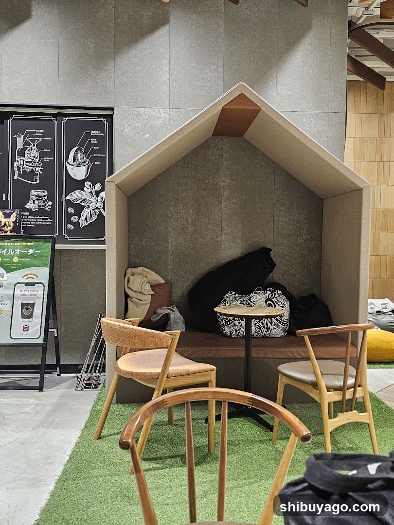 Cozy seating area with house-shaped nook