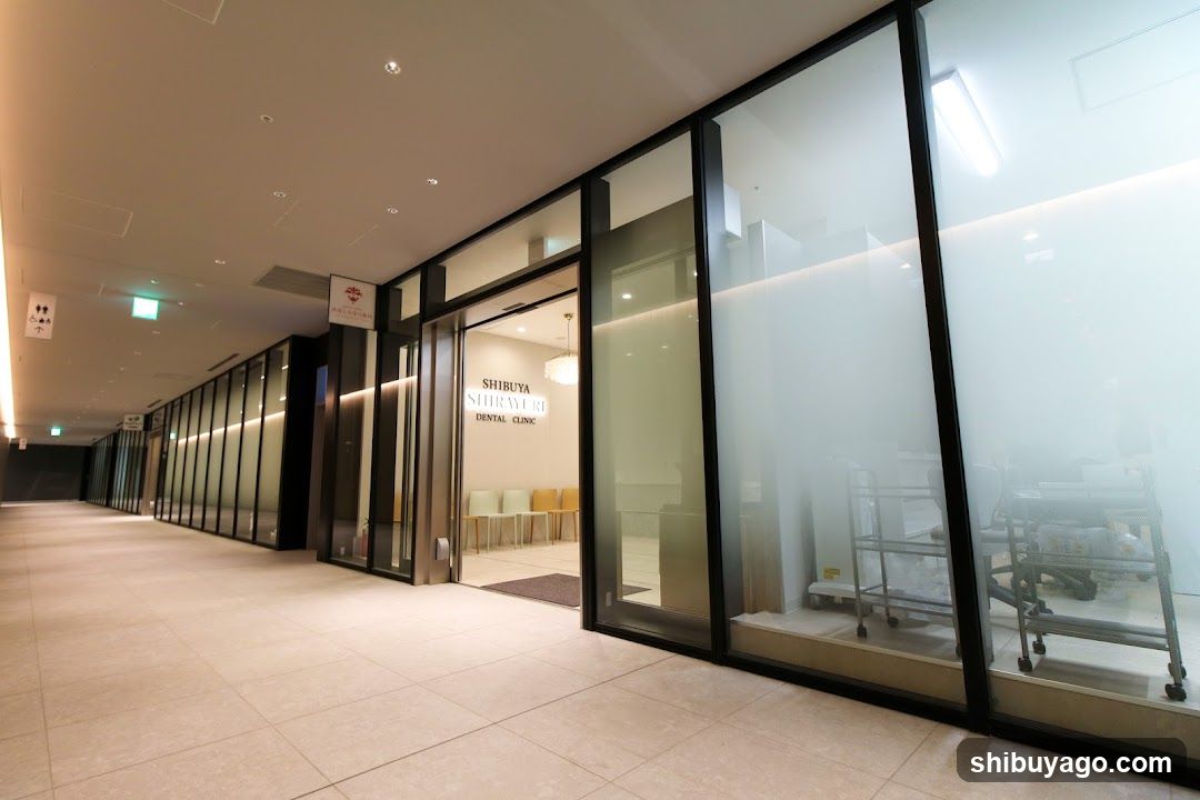 Interior hallway with glass-walled rooms