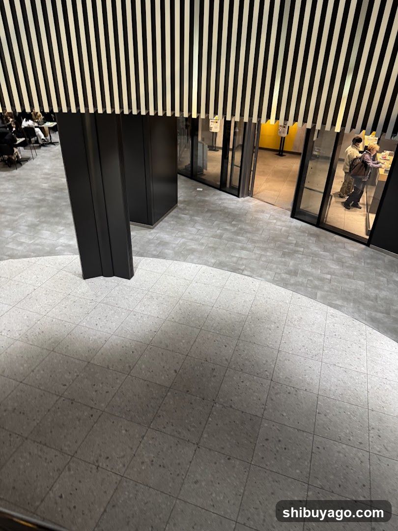 Interior Lobby with Seating Area and Glass Entrance