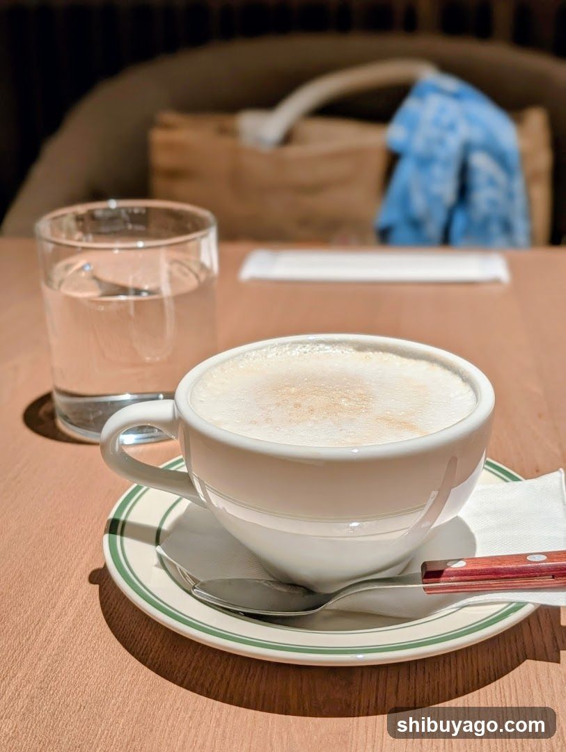 Coffee and Water on a Wooden Table