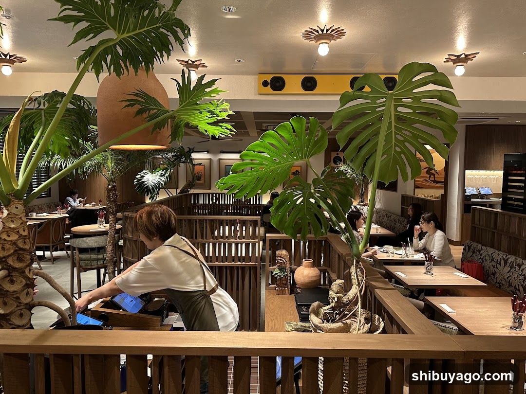 Restaurant Interior with Staff and Plants