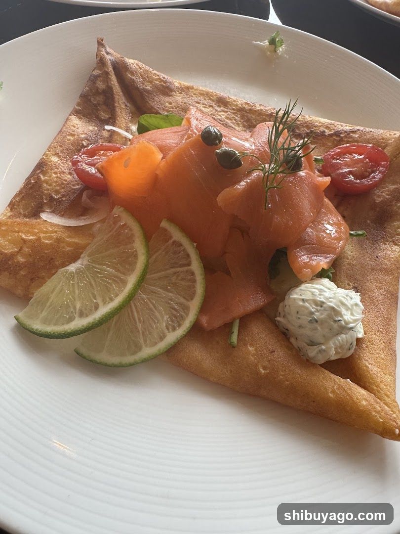 Salmon Crepe with Capers and Tomatoes