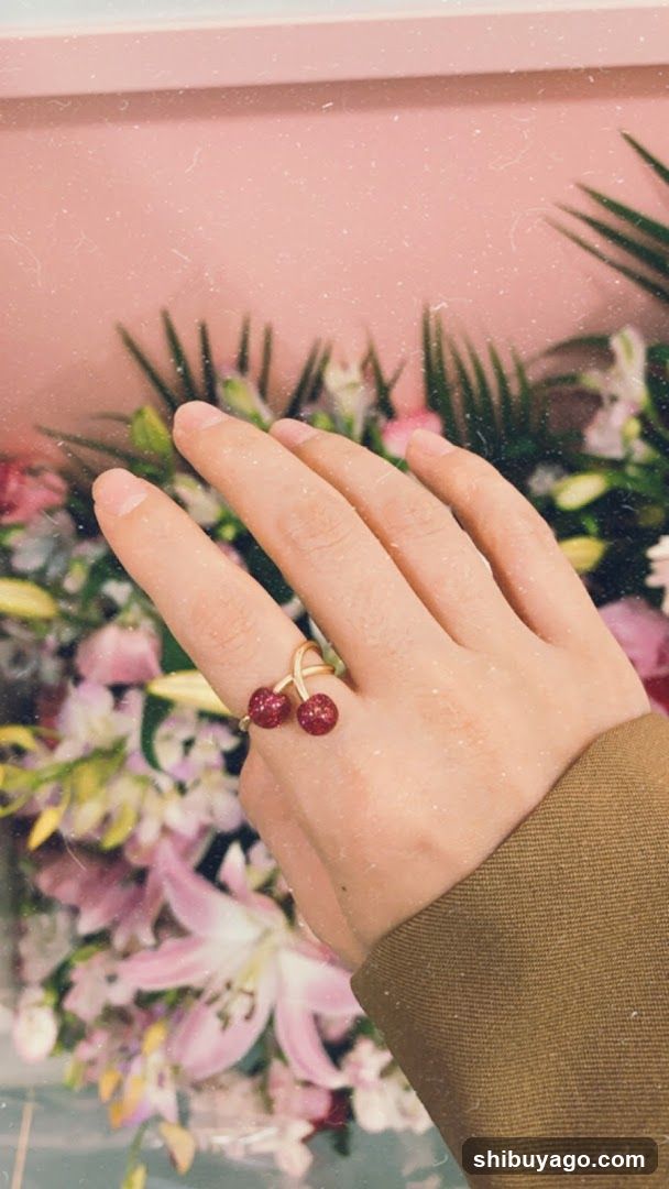 Hand with Cherry Ring
