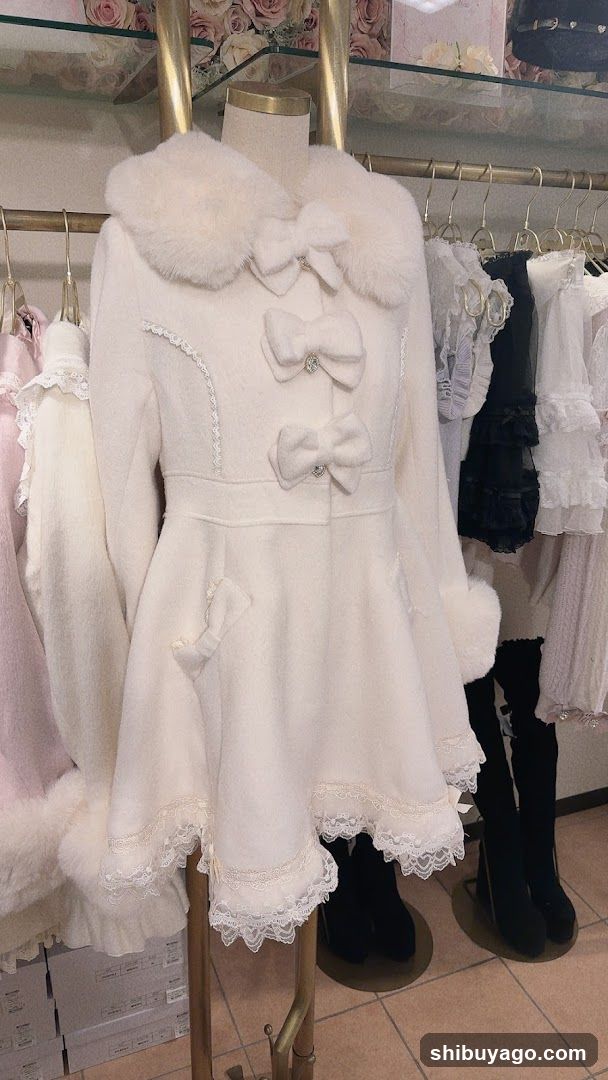 White Fur-Collared Coat Display