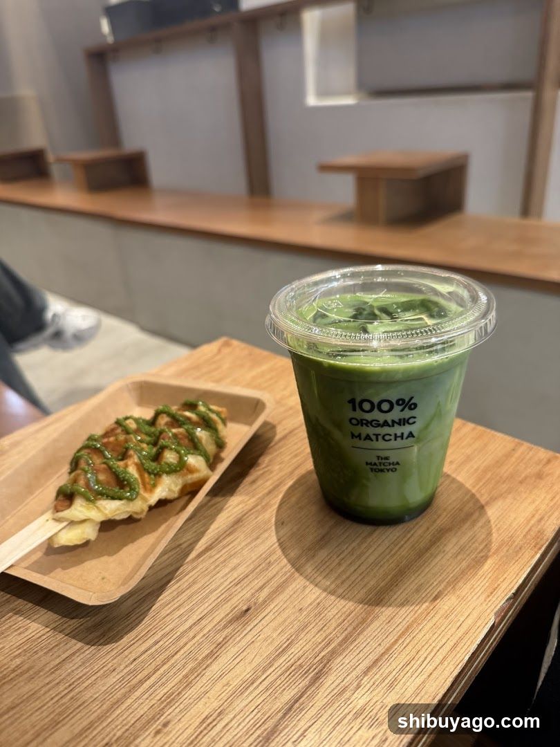 Matcha Drink and Waffle on Wooden Table