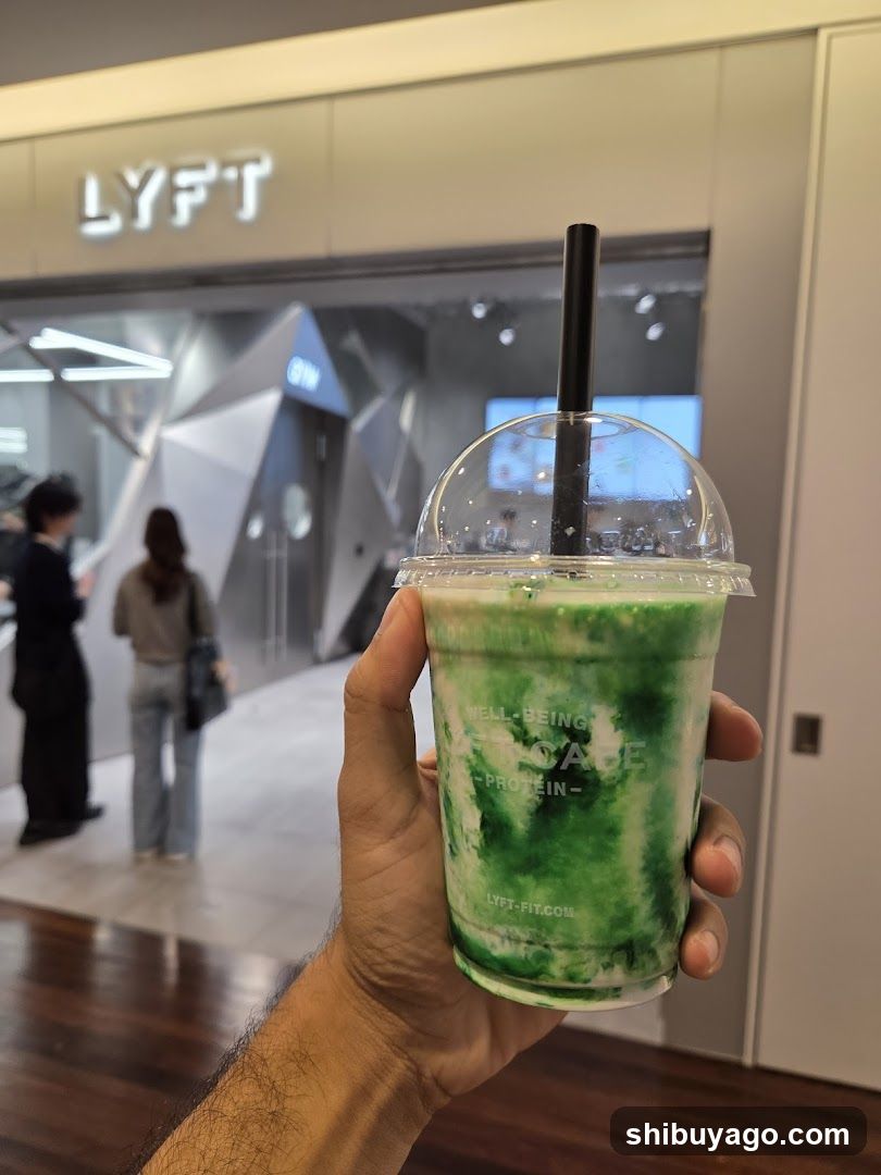 Green Matcha Drink in Front of Lyft Store