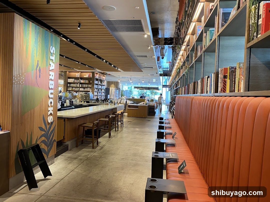 Starbucks Interior with Bookshelves and Orange Booths