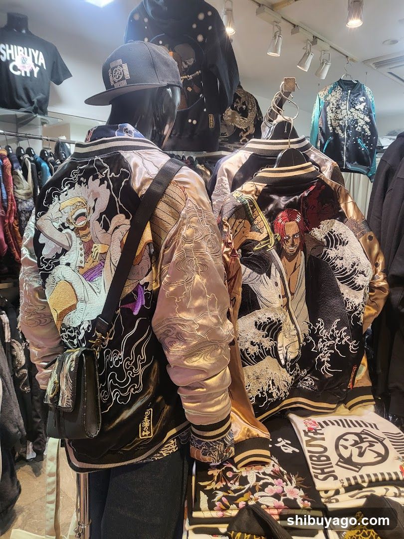 Anime-themed bomber jackets in a store display