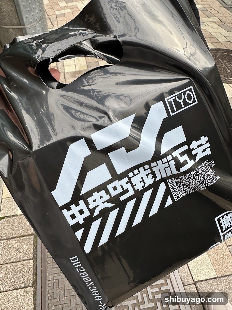 Black plastic bag with white graphics and Chinese characters