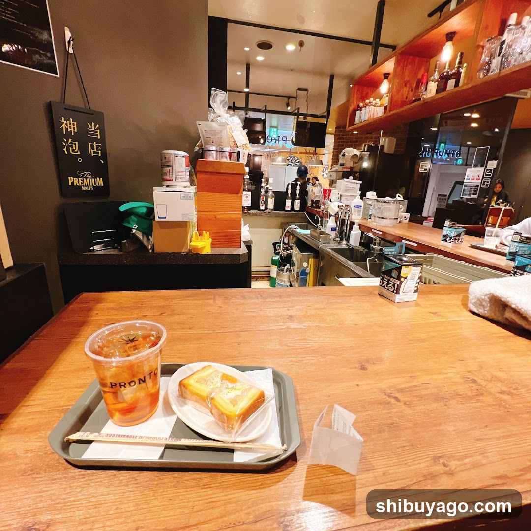 Interior of a cafe or shop with food and drink on table