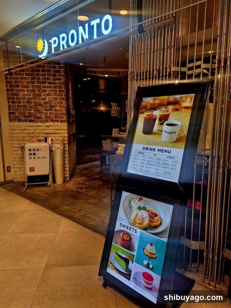 A photo of the physical exterior entrance to a shop named PRONTO, with visible signage above the door and brick wall facade.