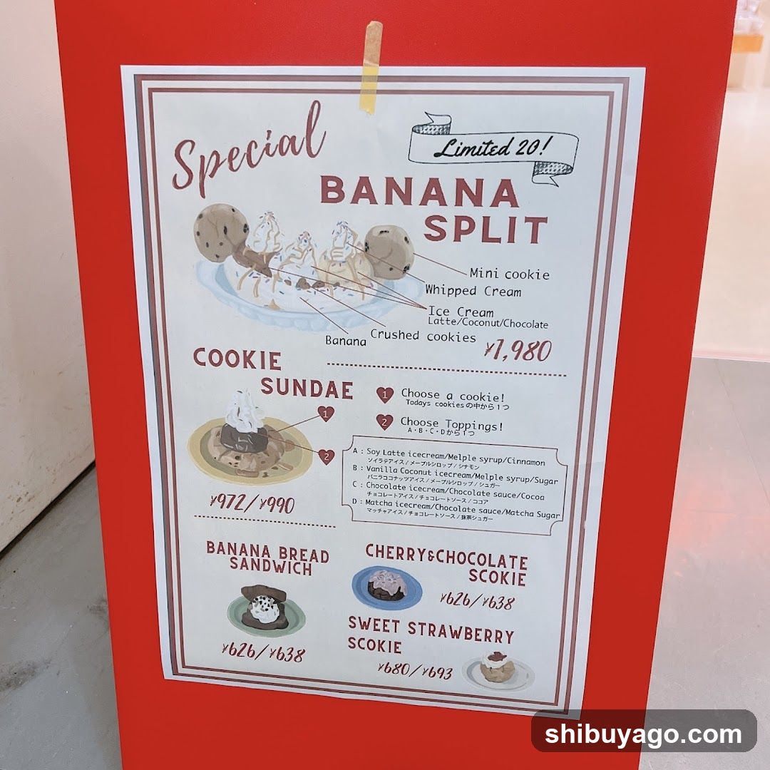 A printed menu board on a red stand displaying special banana split desserts with prices and ingredient options.
