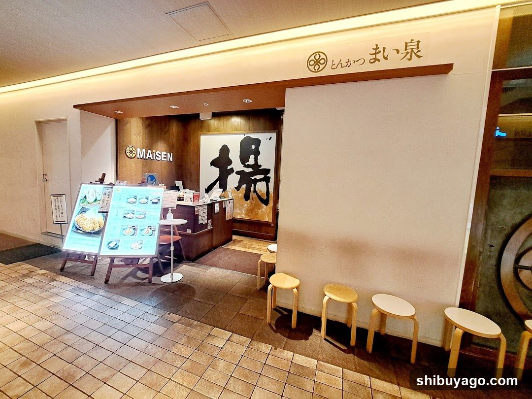 Restaurant Interior with Menu Boards and Seating