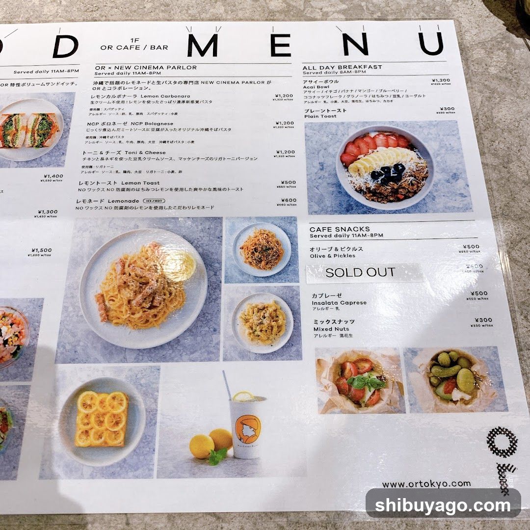 A printed menu from Orto Tokyo, featuring breakfast and cafe snacks sections with Japanese and English descriptions.