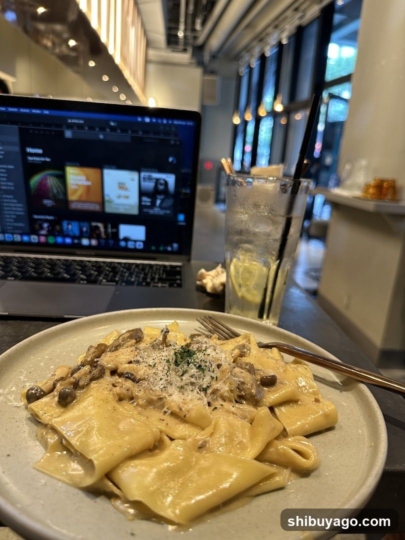 Pasta and Laptop at Cafe