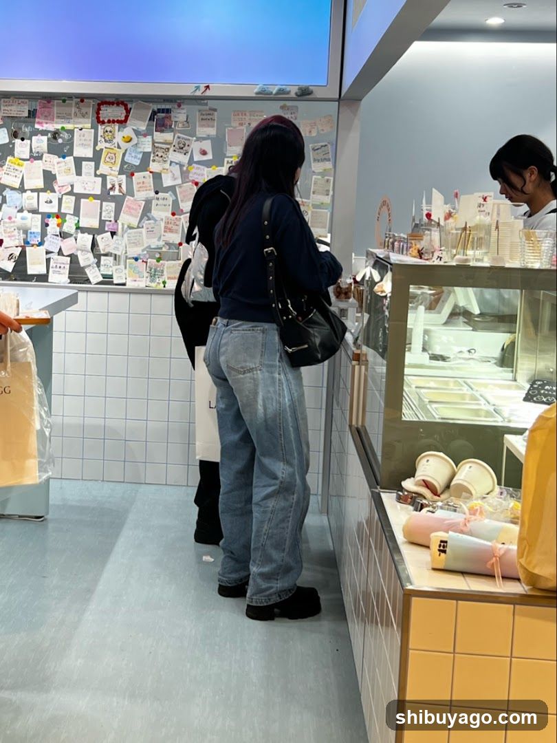 Interior of a shop with customers and staff