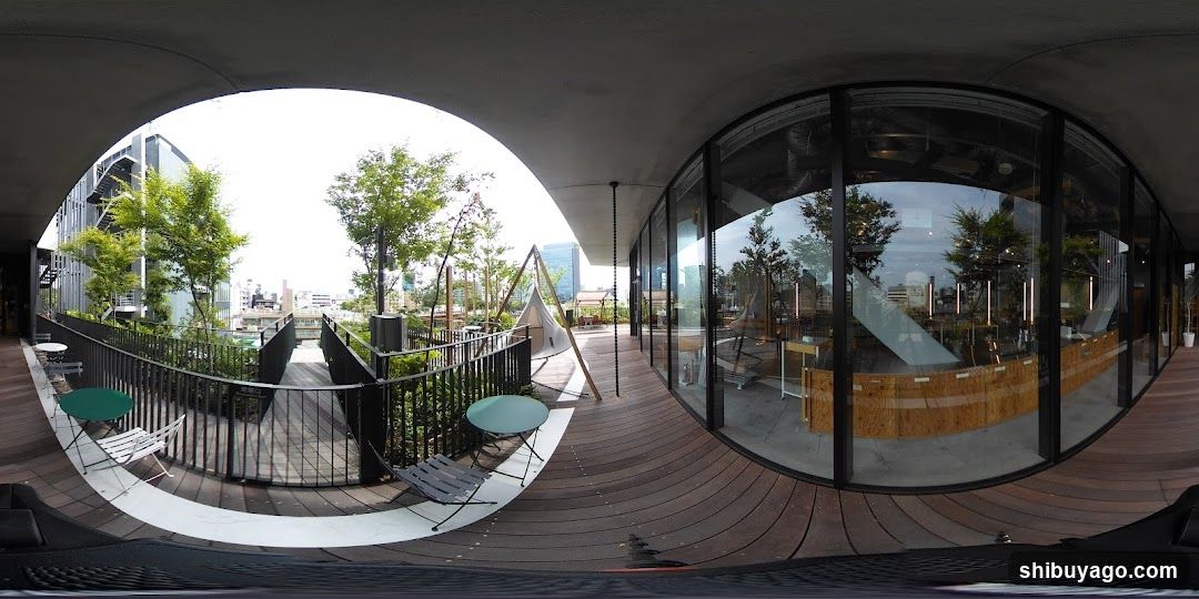 Modern Rooftop Terrace with Glass Facade