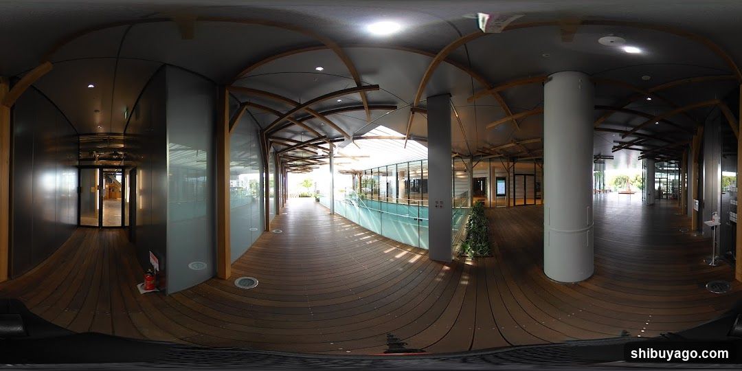 Interior Hallway with Wooden Flooring and Glass Walls