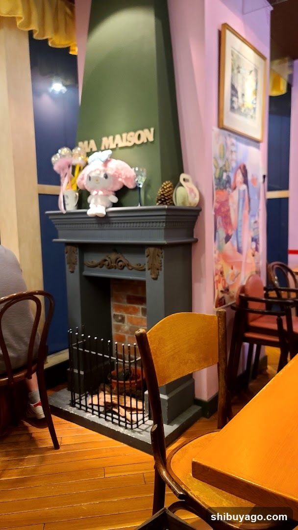 Interior of a cozy cafe with fireplace and plush decor