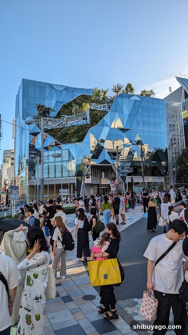 Crowded Street with Modern Building