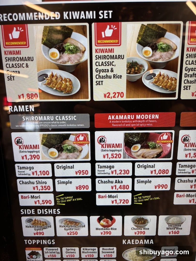 A close-up of a digital or printed menu board featuring recommended sets, ramen varieties with prices, side dishes, and toppings.