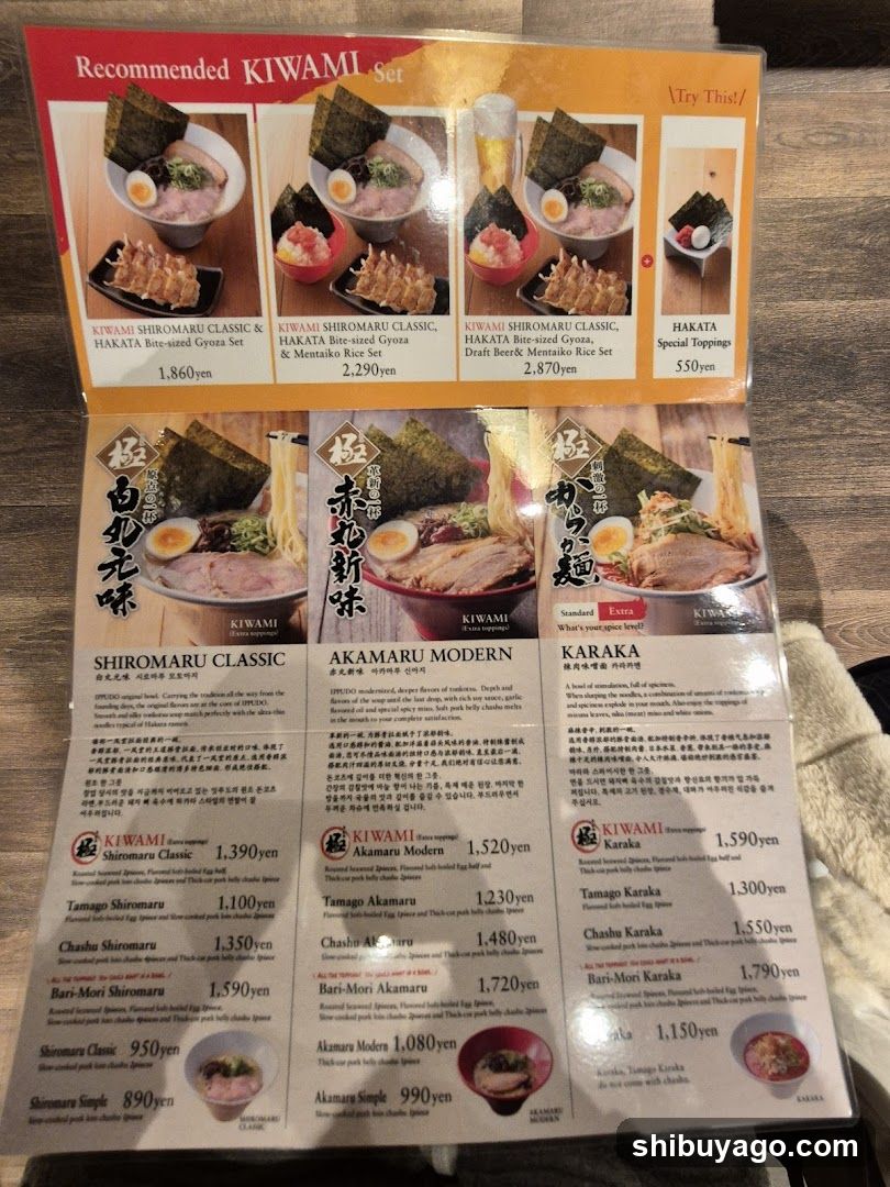 A printed menu featuring recommended sets and ramen varieties with prices in yen.
