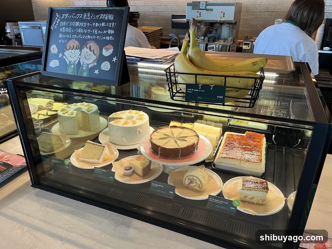 Cafe Display Case with Pastries and Bananas