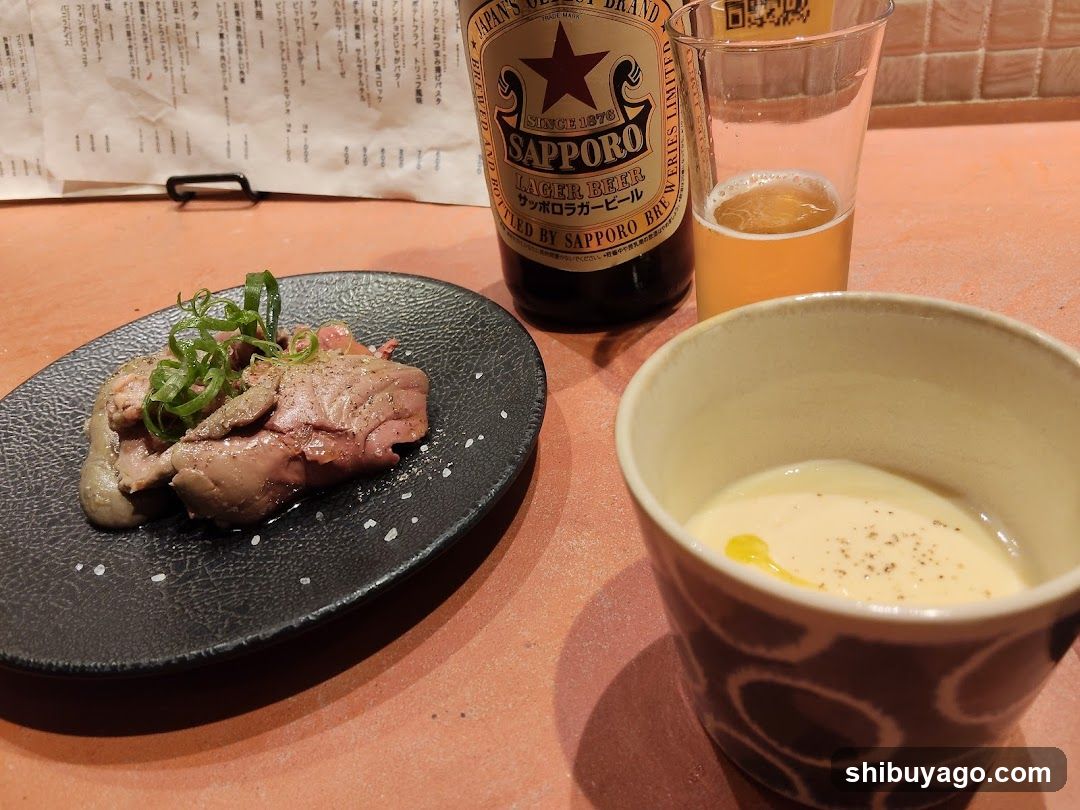 Sapporo Beer and Meat Dish
