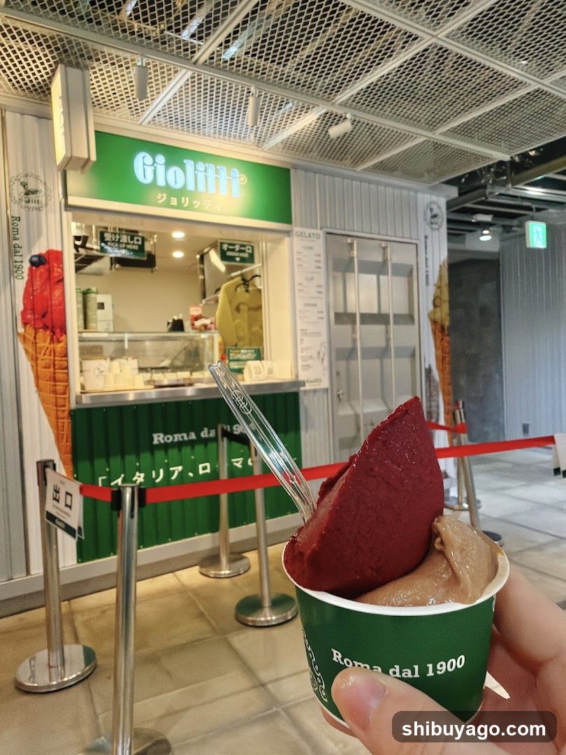 Gelato Cup in Front of Giolitti Storefront
