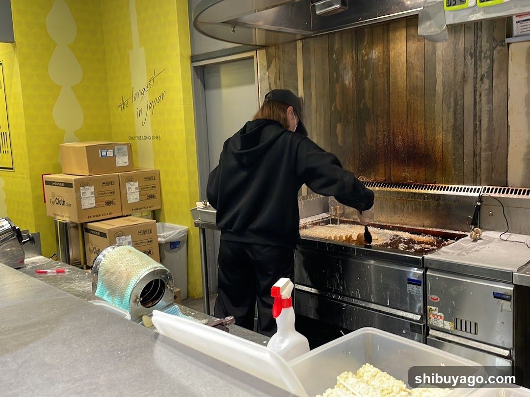 Kitchen Interior with Staff Cooking