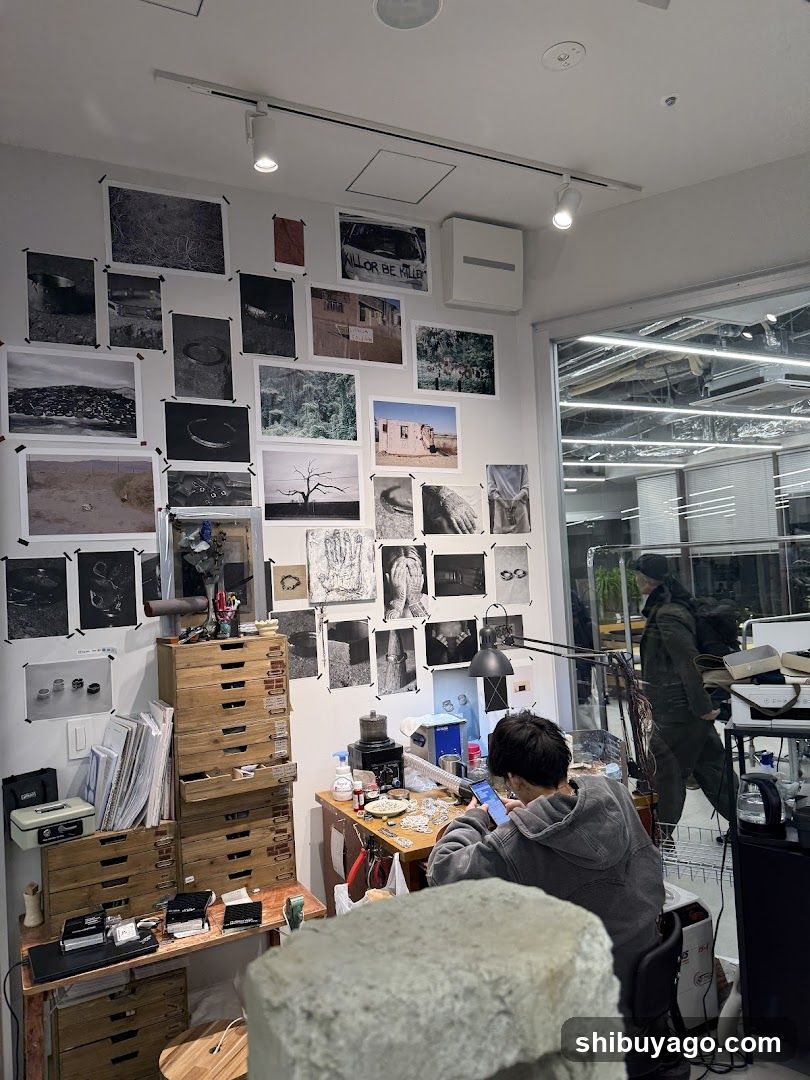 Interior workspace with art prints and work area