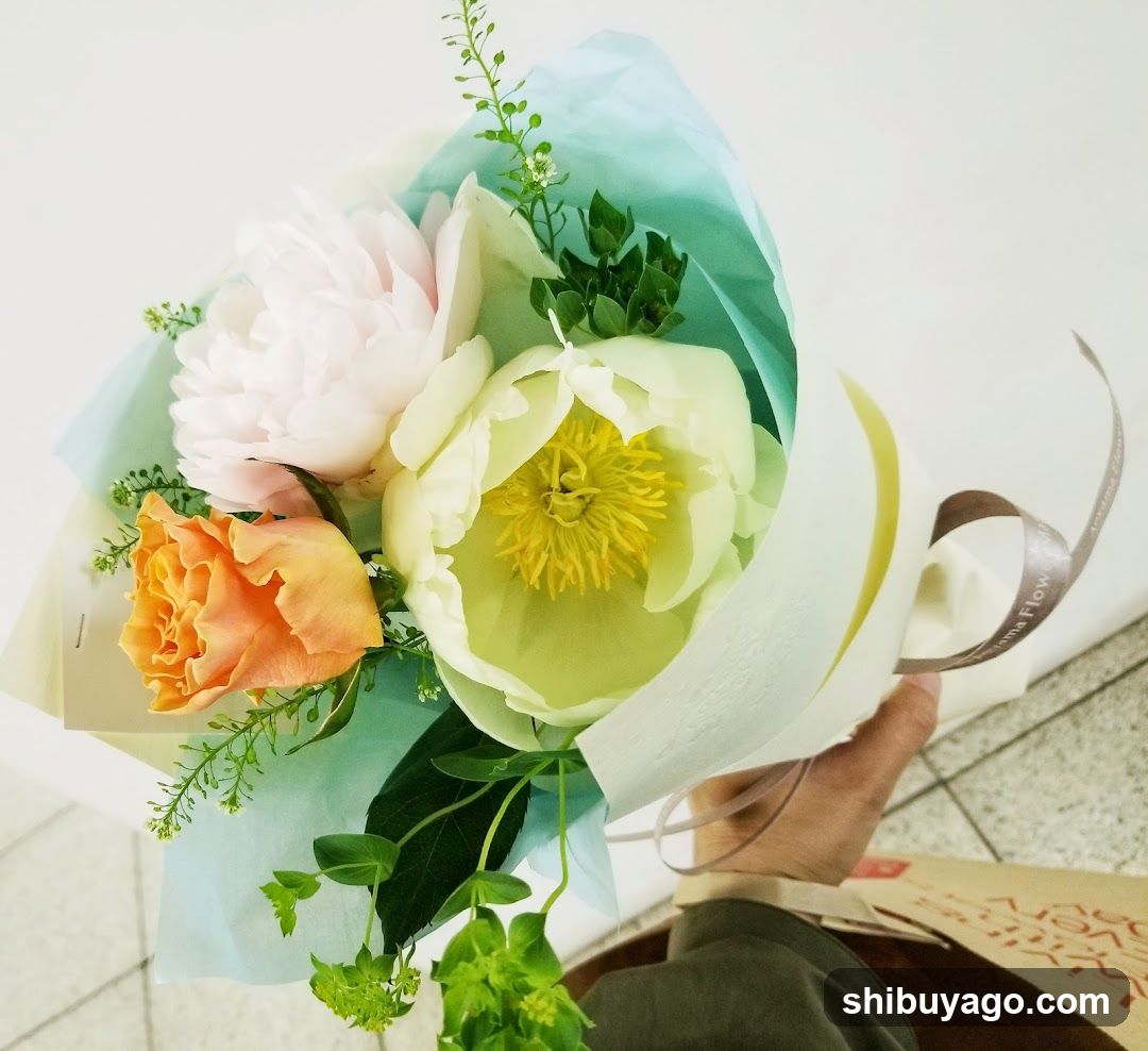 Flower Bouquet Held by Hand