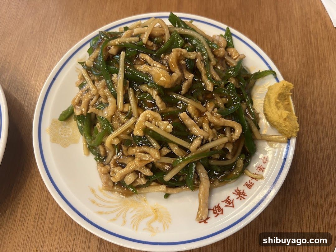 Stir-fried meat with green vegetables