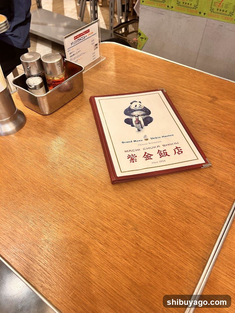 Restaurant Table with Menu and Condiments