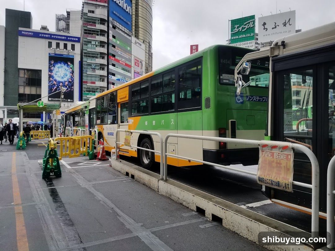 Bus Station Scene with Green and Yellow Bus