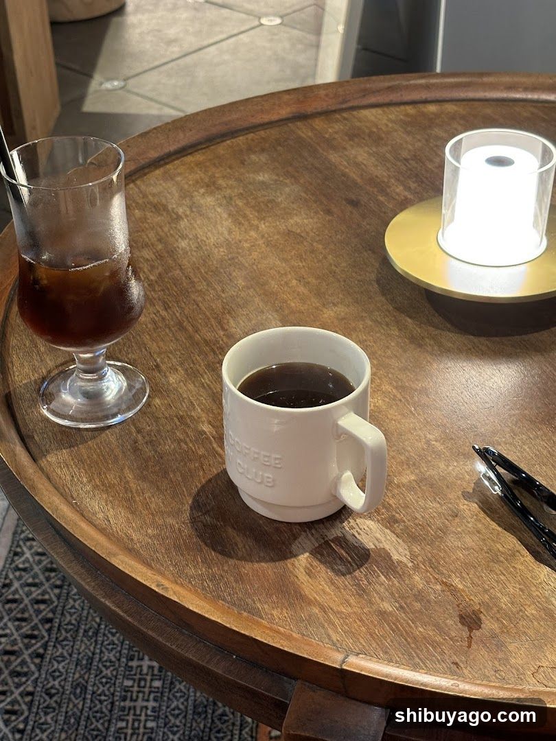 Coffee and Iced Drink on Wooden Table