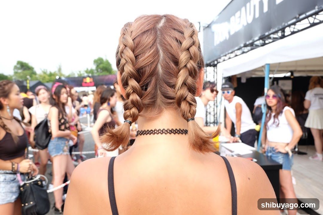Festival Crowd with Braided Hairstyle