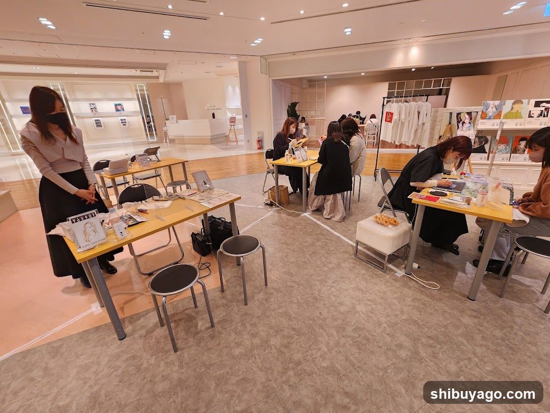 Interior of a retail space with tables and staff