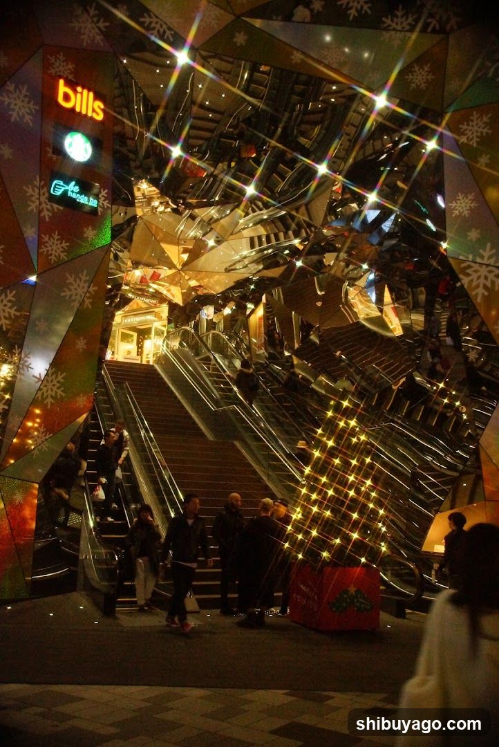 Night scene with illuminated escalators and festive decorations