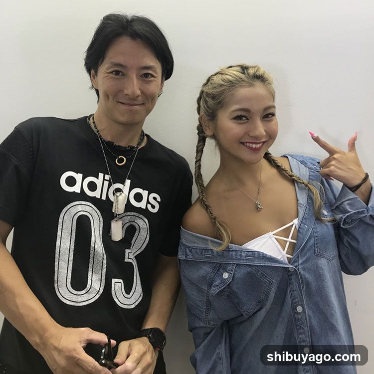 Two people posing together