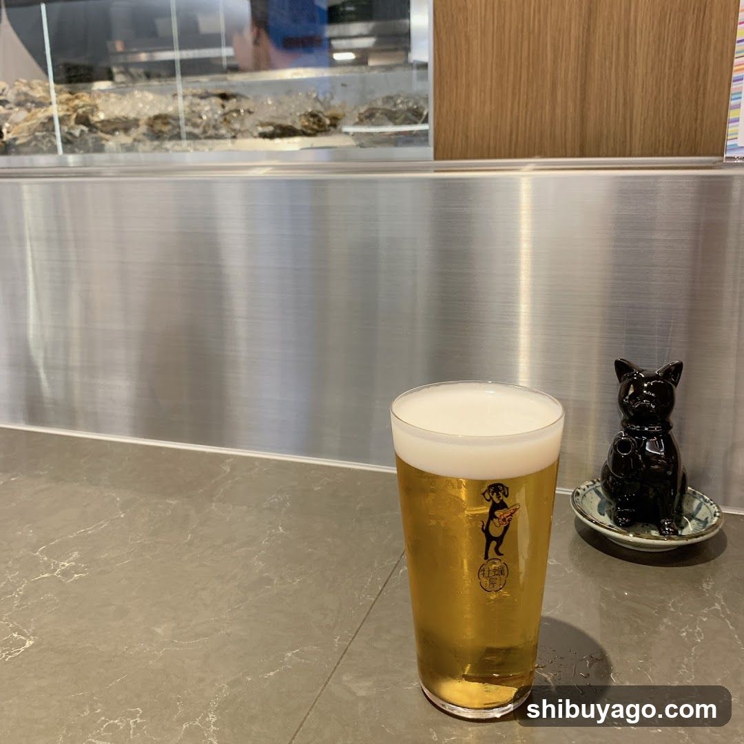 Beer Glass and Cat Figurine