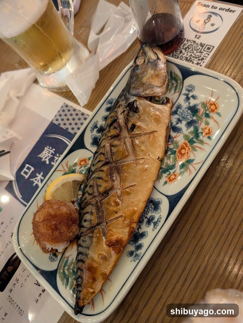 Grilled Mackerel with Lemon and Fried Rice Ball
