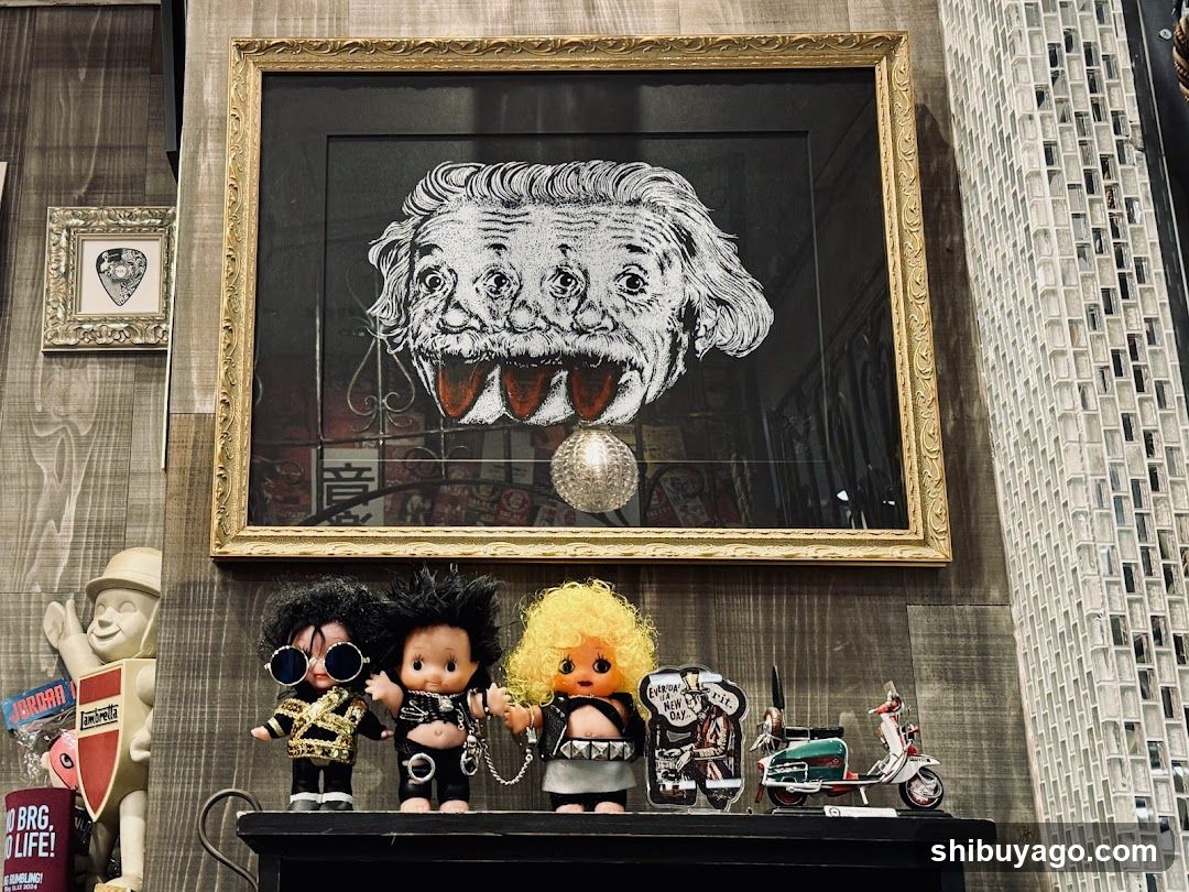 Art Display with Dolls and Framed Artwork